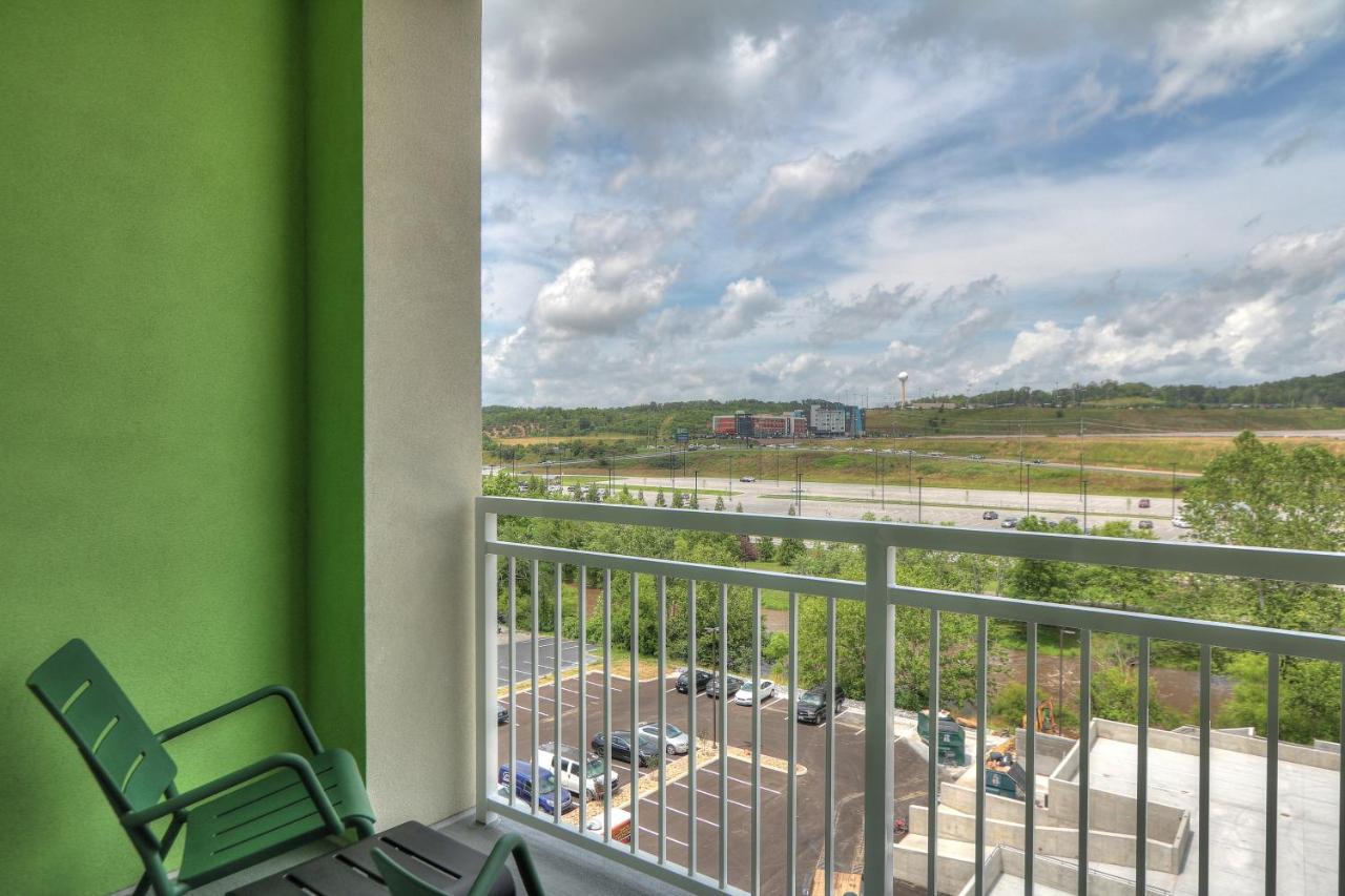Queen Room with Two Queen Beds River Balcony and High Floor - Non-Smoking at Holiday Inn & Suites Pigeon Forge Convention Center by IHG