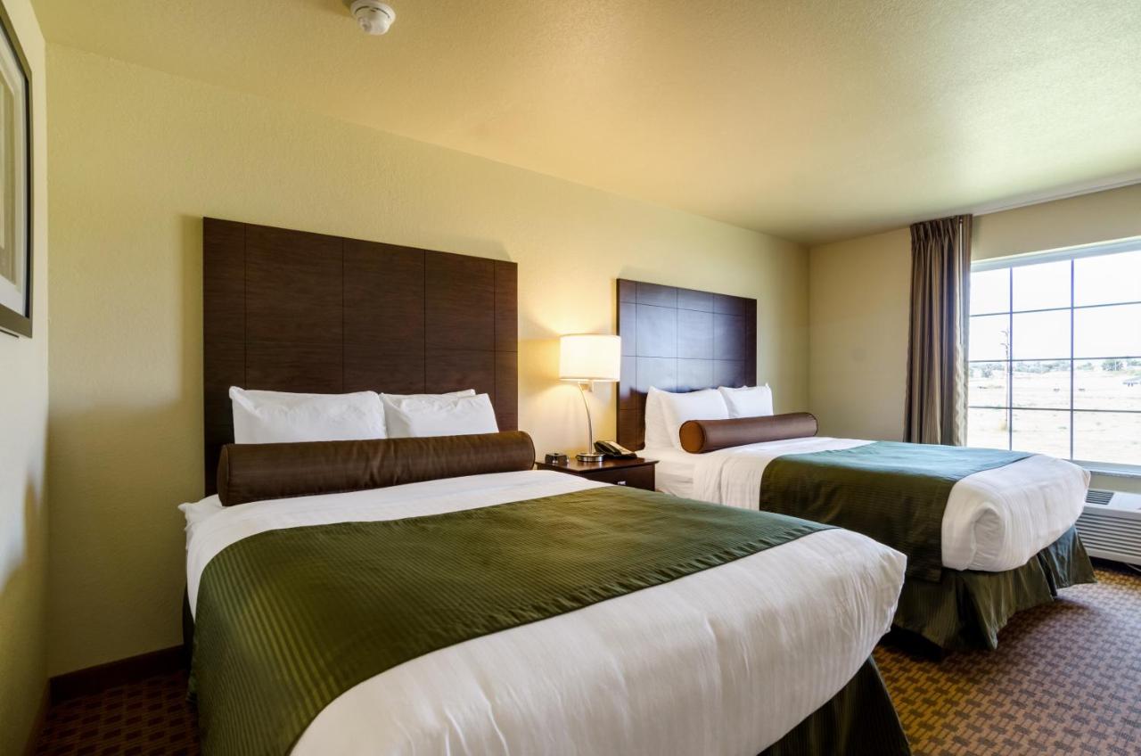 Deluxe Queen Room with Two Queen Beds at Cobblestone Inn & Suites - Cambridge