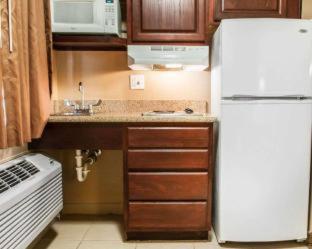 Efficiency Double Room with Two Double Beds - Smoking at Suburban Studios Alamogordo