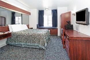 Room #53162015 at Days Inn & Suites by Wyndham Greeley