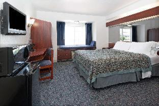 Room #53162017 at Days Inn & Suites by Wyndham Greeley