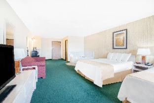 Room #114718814 at Days Inn & Suites by Wyndham Fargo 19th Ave/Airport Dome