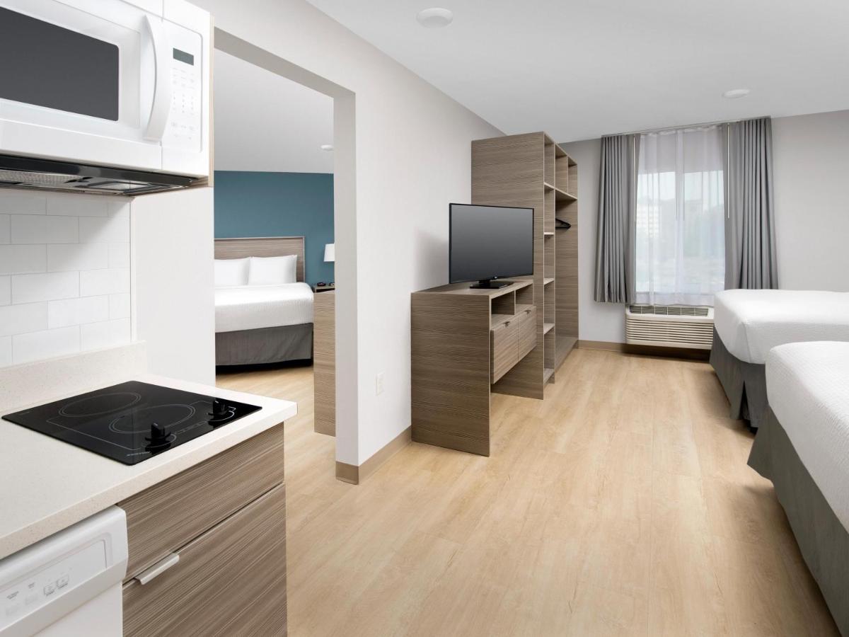 Standard Queen Room with Three Queen Beds - Non-Smoking at WoodSpring Suites Seattle Tukwila