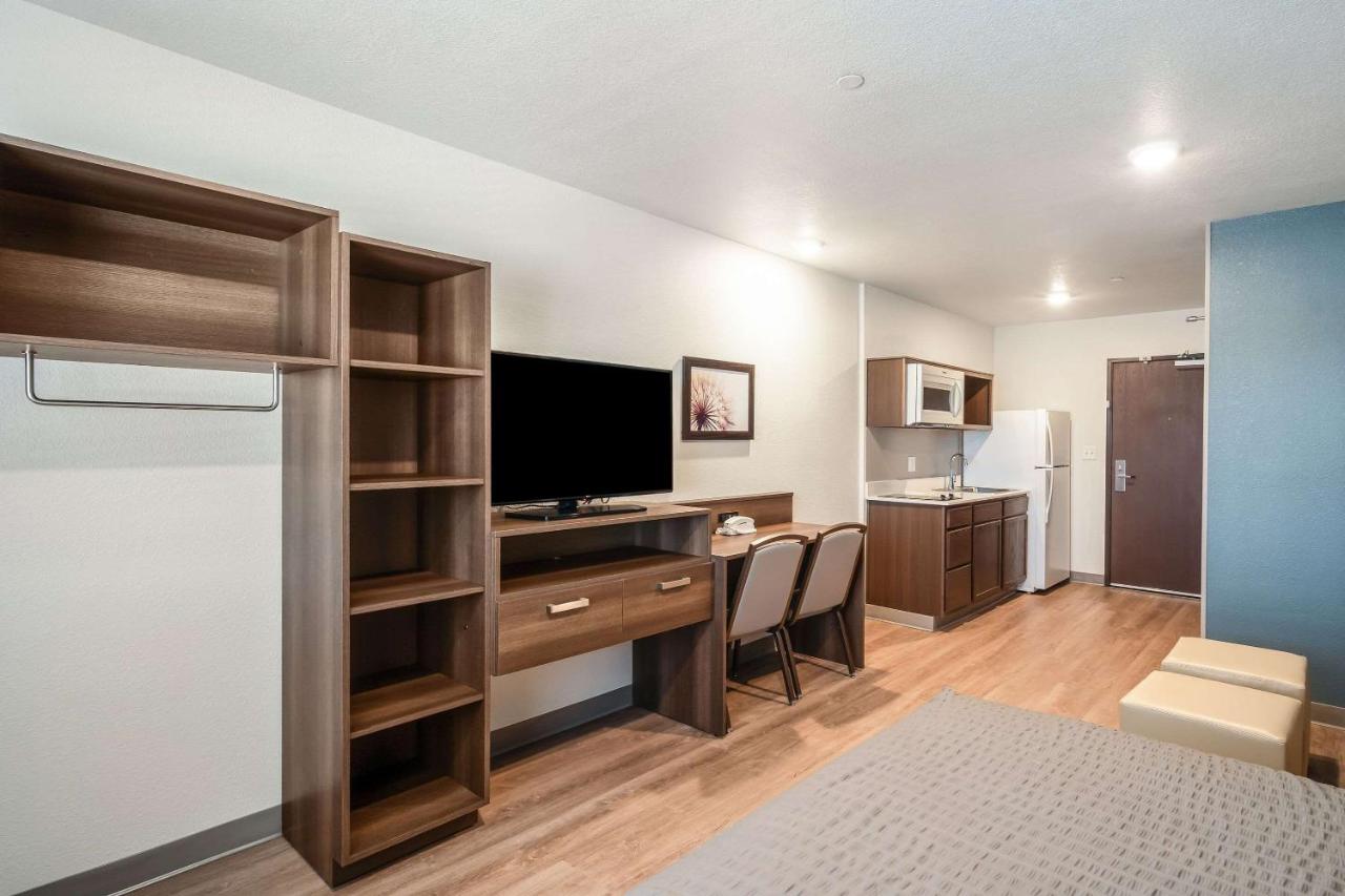 Queen Room with Tub - Disability Access/Non-Smoking at WoodSpring Suites Naples West