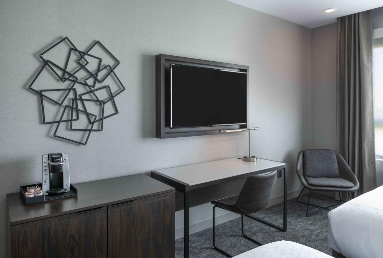 Queen Room with Two Queen Beds - Hearing Accessible - Non-Smoking at Holiday Inn Express Boston Logan Airport - Revere by IHG