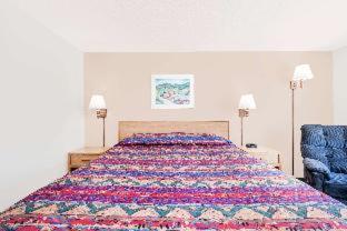 Room #32050608 at Super 8 by Wyndham Belle Fourche SD