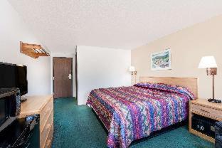 Room #32050608 at Super 8 by Wyndham Belle Fourche SD