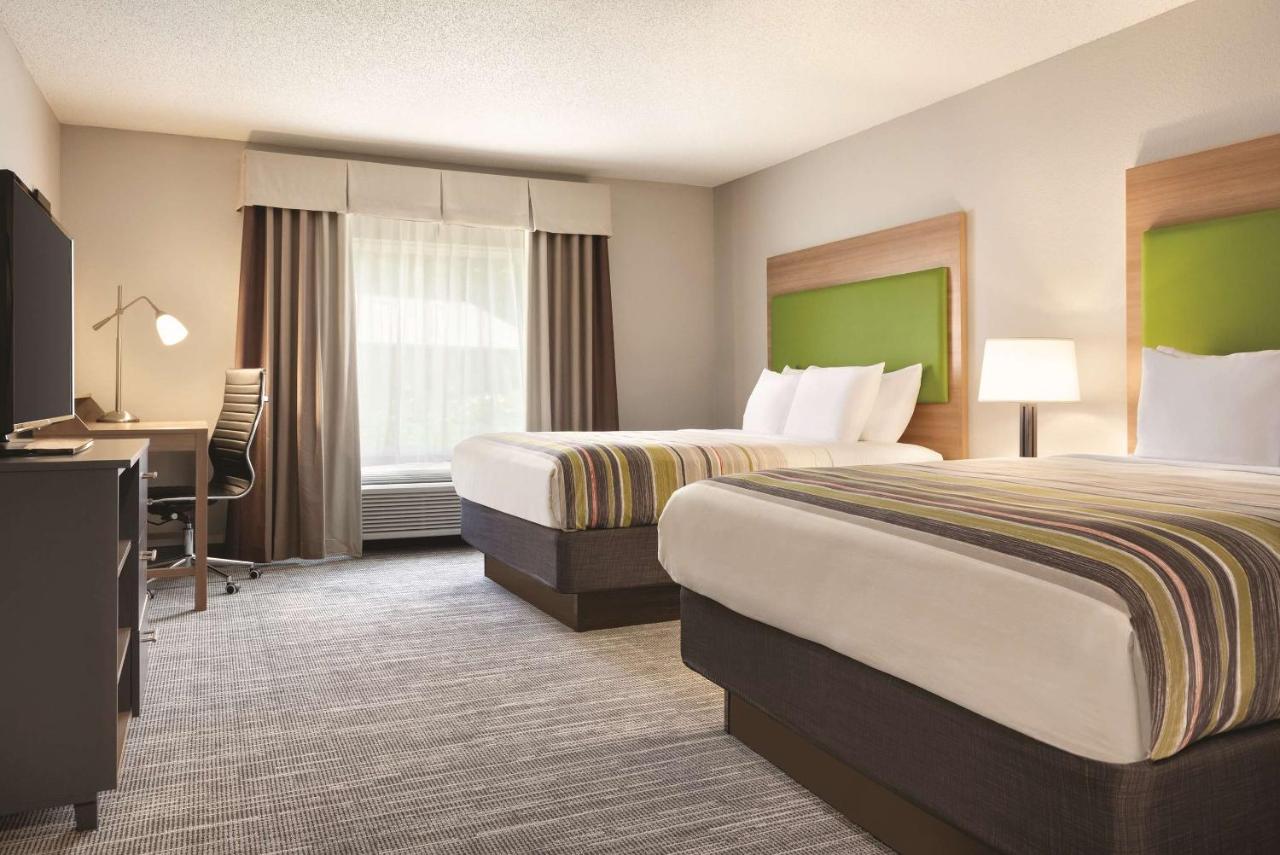 Queen Room with Two Queen Beds at Country Inn & Suites by Radisson, Greensboro, NC