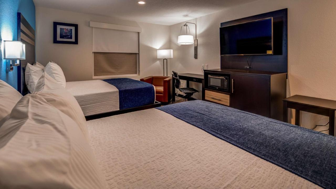 Queen Room with Two Queen Beds at SureStay Plus Hotel by Best Western Humble