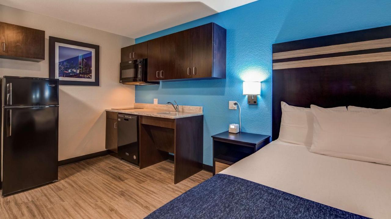 King Room with Roll-In Shower - Disability Access at SureStay Plus Hotel by Best Western Humble