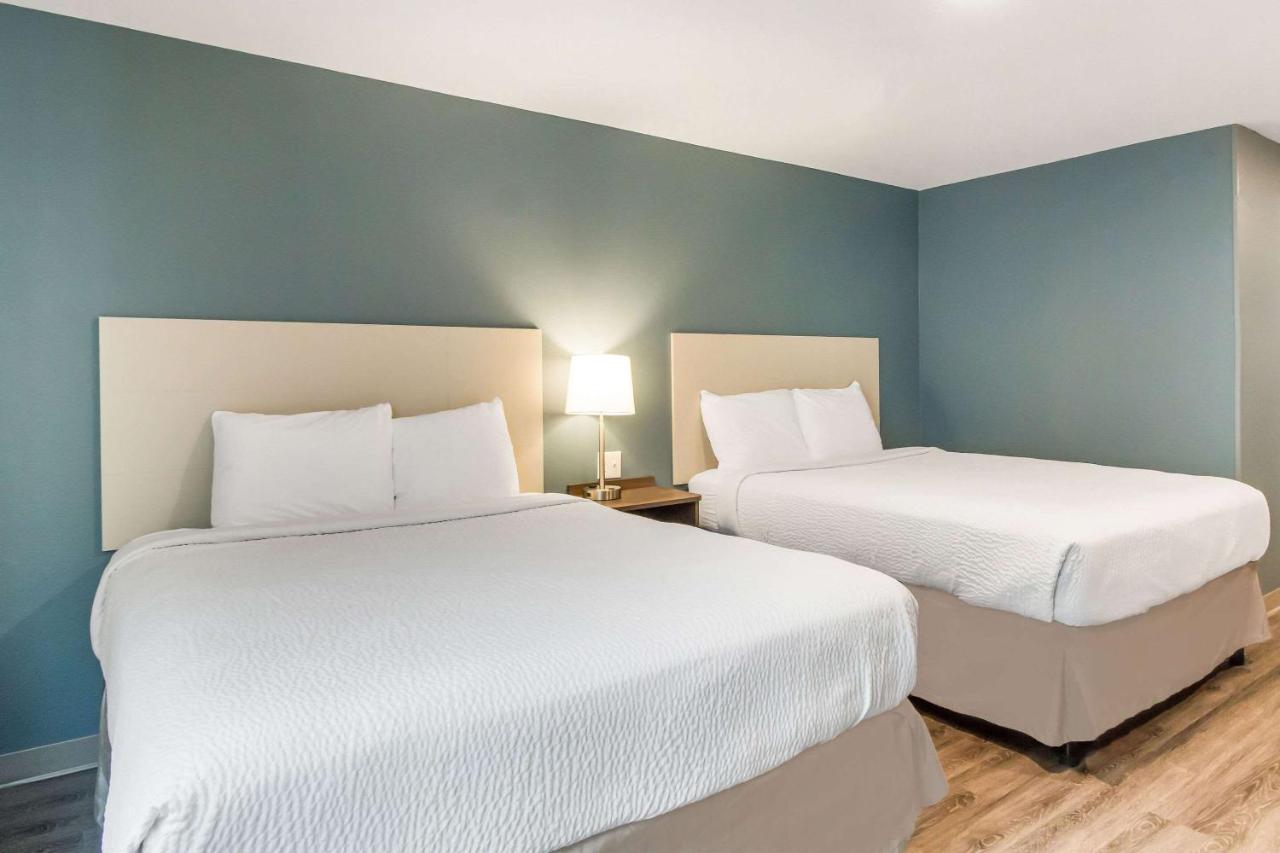 Queen Room with Two Queen Beds - Accessible/Non-Smoking at WoodSpring Suites Lake Jackson