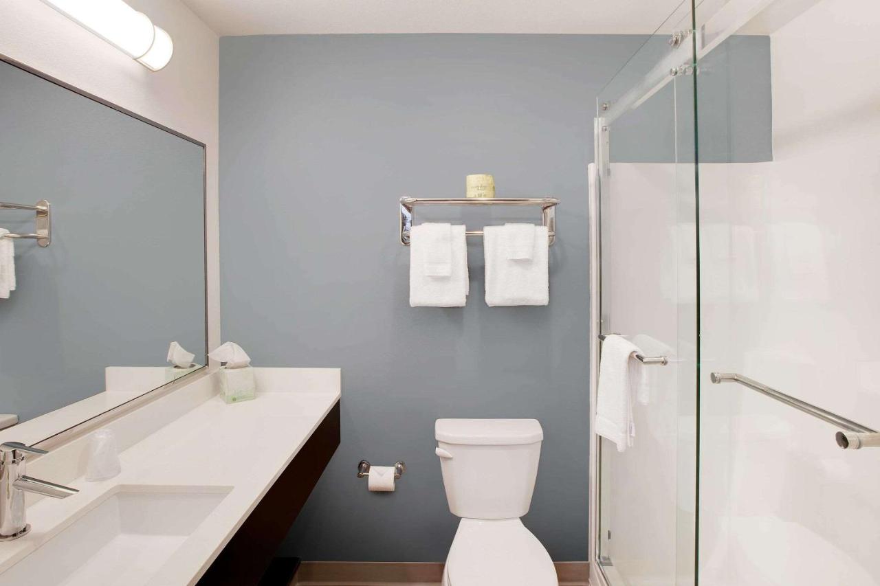 Queen Room - Accessible/Non-Smoking at WoodSpring Suites Plano - North Dallas