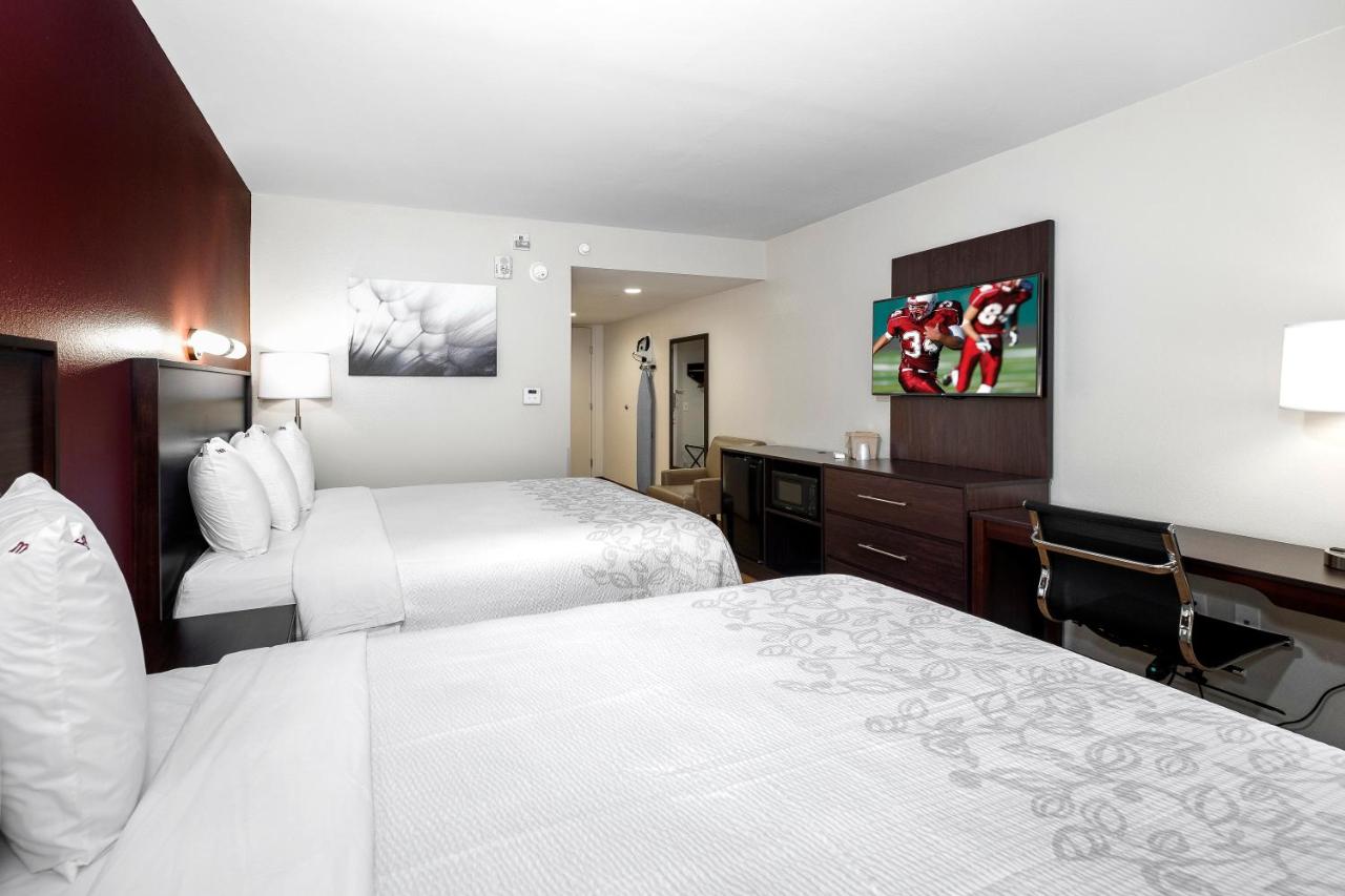 Deluxe Room with Two Queen Beds Disability Access Roll-In Shower Smoke Free at Red Roof Inn PLUS+ Tuscaloosa - University