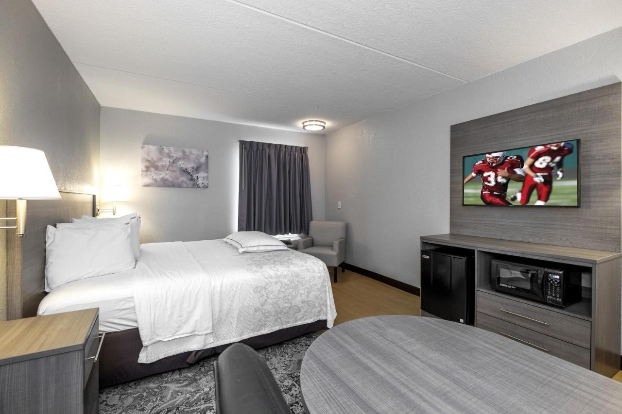 Premium King Room Smoke Free (Upgraded Bedding and Snack Box) at Red Roof Inn PLUS+ Boston - Mansfield/ Foxboro