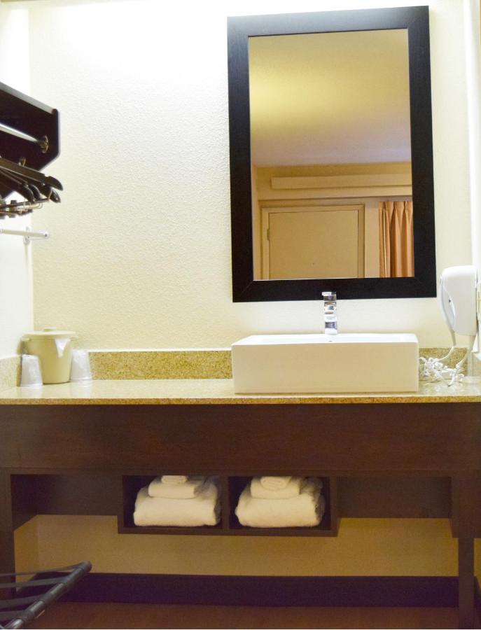 Premium King Room Smoke Free (Upgraded Bedding & Snack Box) at Red Roof Inn PLUS+ University at Buffalo - Amherst