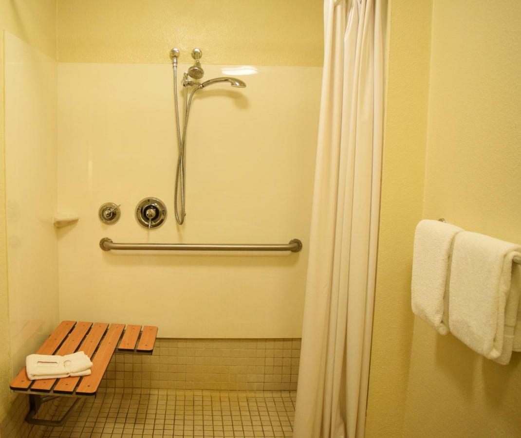 Superior King Room Disability Access Roll-In Shower Smoke Free at Red Roof Inn PLUS+ University at Buffalo - Amherst
