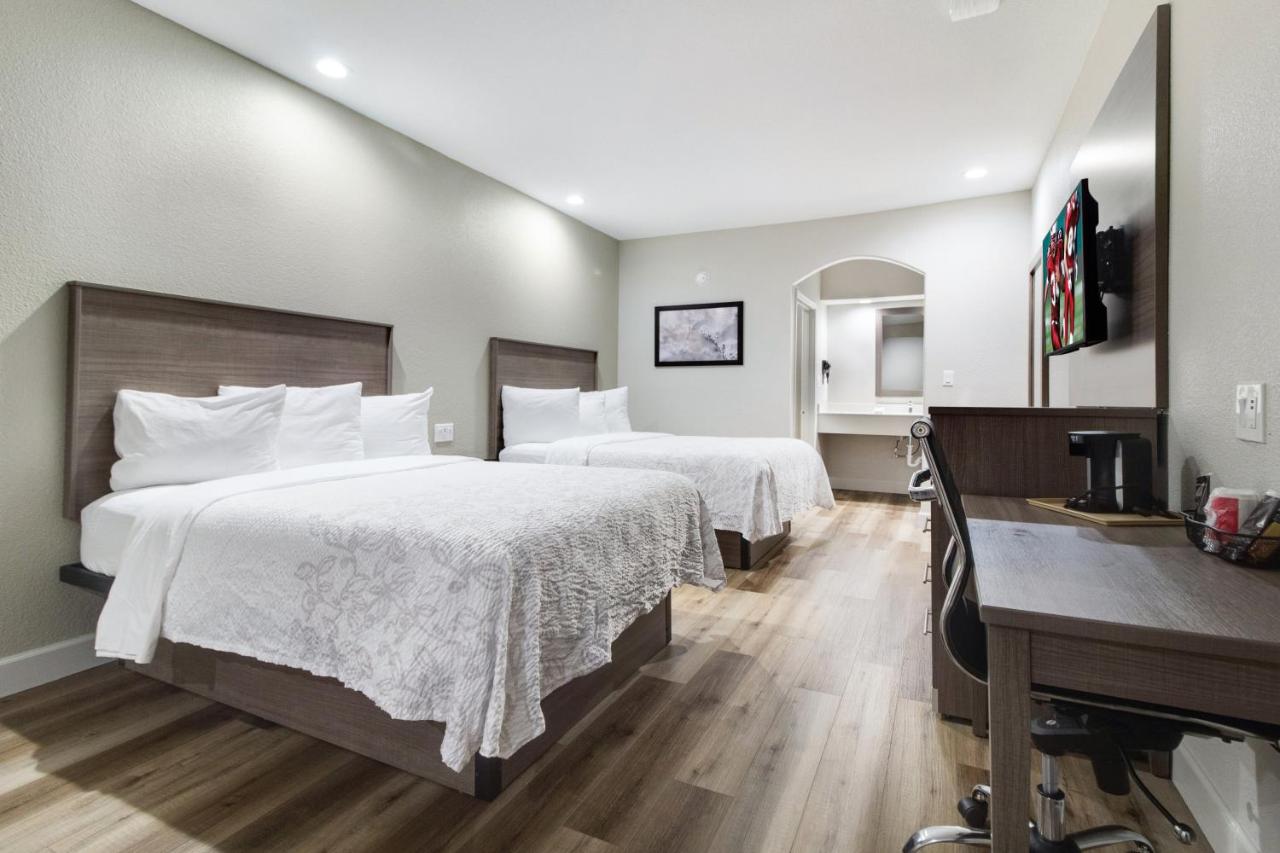 Premium Queen Room with Two Queen Beds Smoke Free at Red Roof Inn PLUS+ Galveston - Beachfront