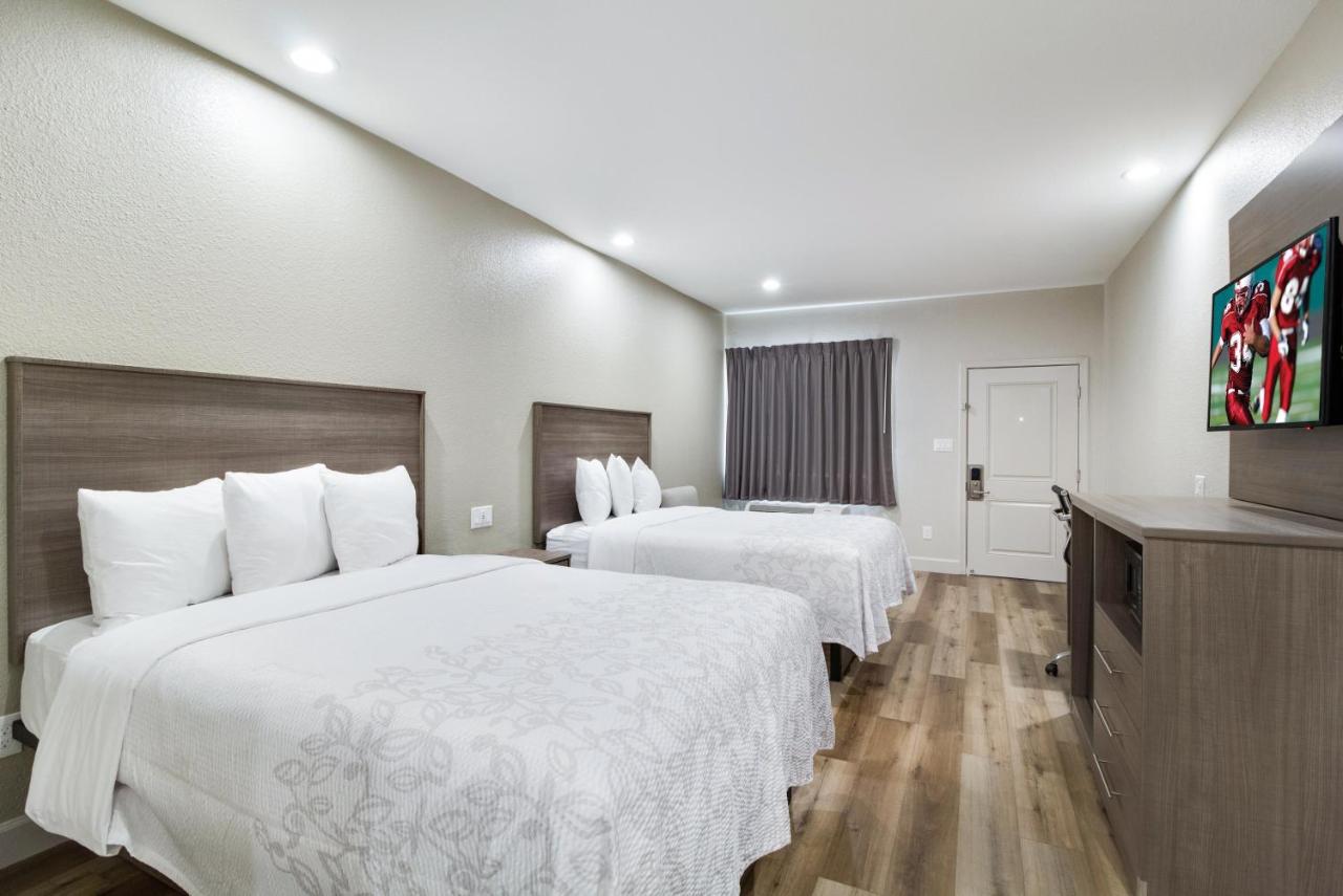 Superior Queen Room with Two Queen Beds - Disability Access/Smoke Free at Red Roof Inn PLUS+ Galveston - Beachfront