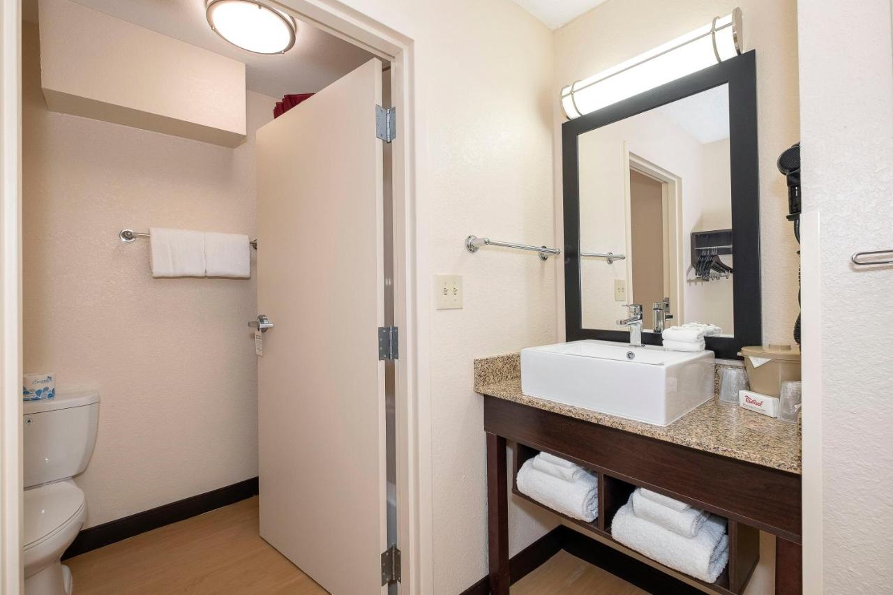 Superior King Room Disability Access Roll-In Shower Smoke Free at Red Roof Inn PLUS+ Jacksonville - Southpoint