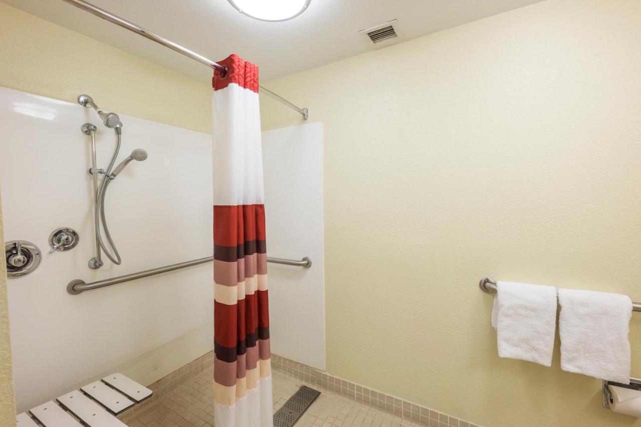 Superior King Room Disability Access Roll-ln Shower Smoke Free at Red Roof Inn PLUS+ West Palm Beach