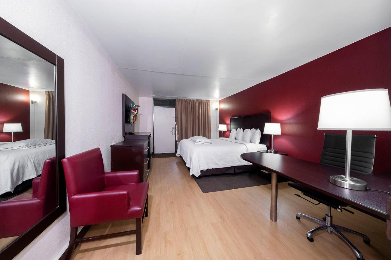 Premium King Room Disability Access Smoke Free (Upgraded Bedding & Snack Box) at Red Roof Inn PLUS+ Huntsville - Madison