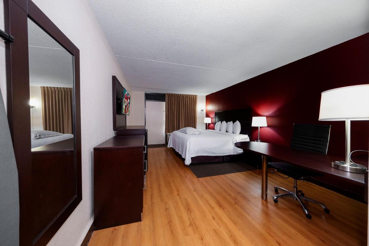 Premium King Room Smoke Free (Upgraded Bedding & Snack Box) at Red Roof Inn PLUS+ Huntsville - Madison