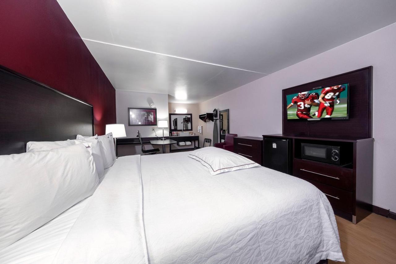 Premium King Room Smoke Free (Upgraded Bedding & Snack Box) at Red Roof Inn PLUS+ Huntsville - Madison