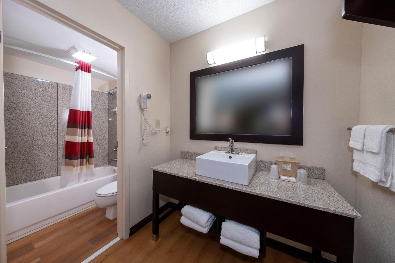 Premium King Room Disability Access Smoke Free (Upgraded Bedding & Snack Box) at Red Roof Inn PLUS+ Huntsville - Madison