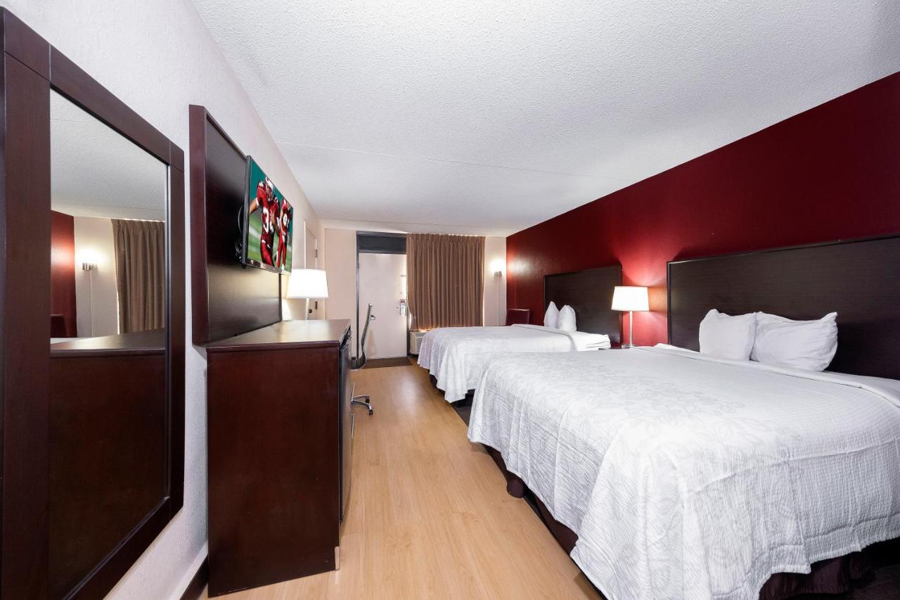 Deluxe Room with Two Queen Beds Smoke Free at Red Roof Inn PLUS+ Huntsville - Madison