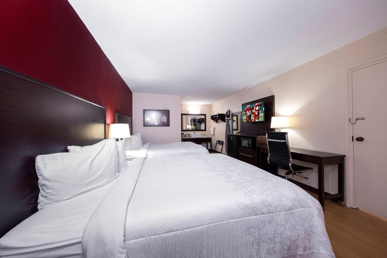 Deluxe Room with Two Queen Beds Smoke Free at Red Roof Inn PLUS+ Huntsville - Madison