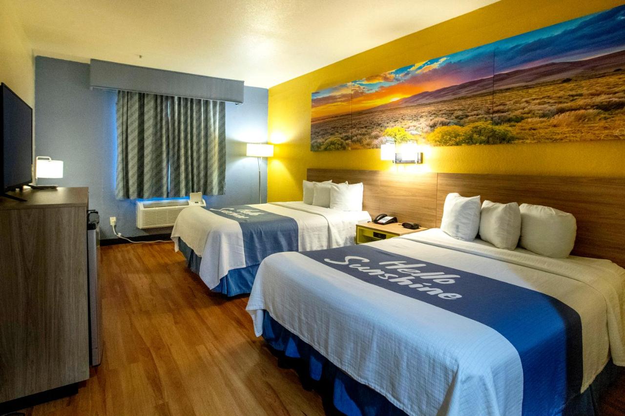 Queen Room with Two Queen Beds - Disability Access - Non-Smoking at Days Inn & Suites by Wyndham Houston North/Aldine