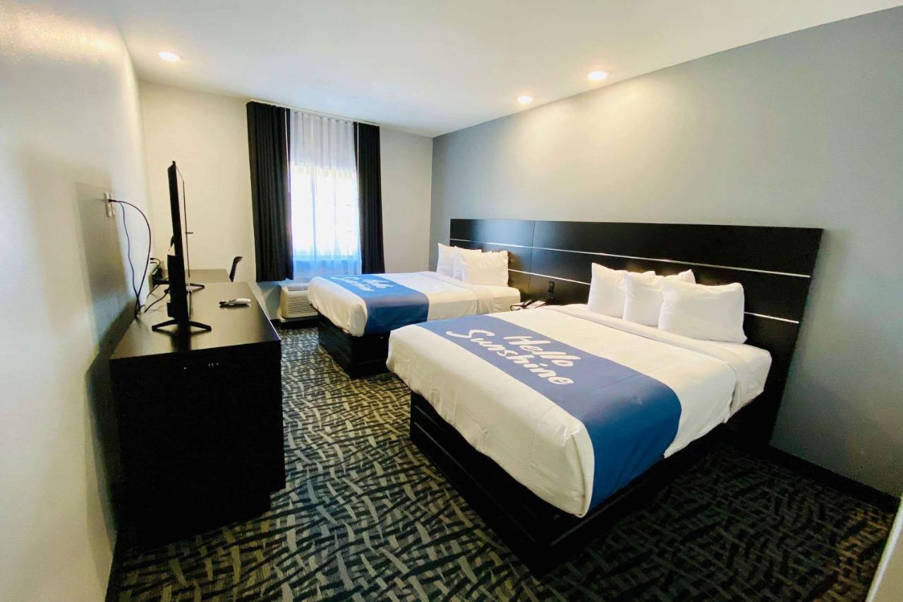 Queen Room with Two Queen Beds and Kitchenette - Non-Smoking at Days Inn & Suites by Wyndham Horn Lake/Memphis Graceland