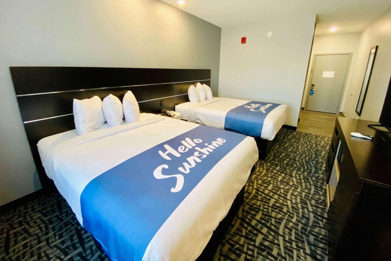 Queen Room with Two Queen Beds - Mobility Access/Non-Smoking at Days Inn & Suites by Wyndham Horn Lake/Memphis Graceland