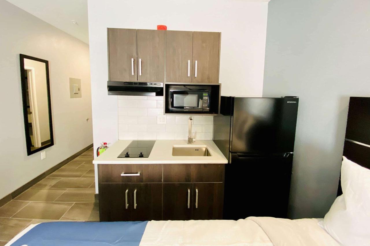 Queen Room with Two Queen Beds and Kitchenette - Non-Smoking at Days Inn & Suites by Wyndham Horn Lake/Memphis Graceland