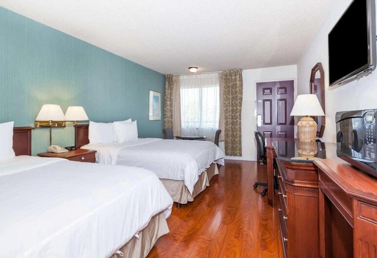 Queen Room with Two Queen Beds - Mobility Access/Non-Smoking at Days Inn & Suites by Wyndham Sunnyvale