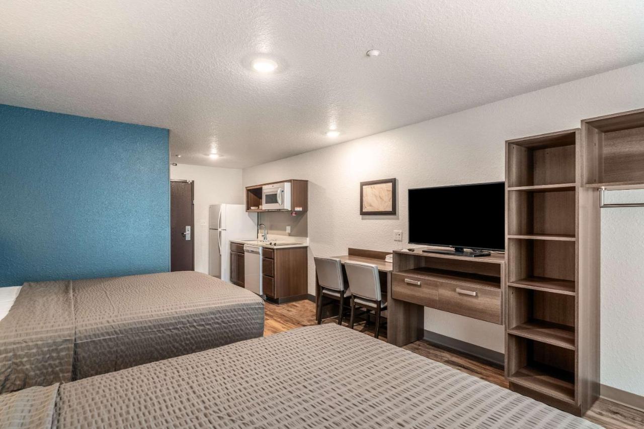 Standard Queen Room with Two Queen Beds - Non-Smoking at WoodSpring Suites Sanford North I-4 Orlando Area