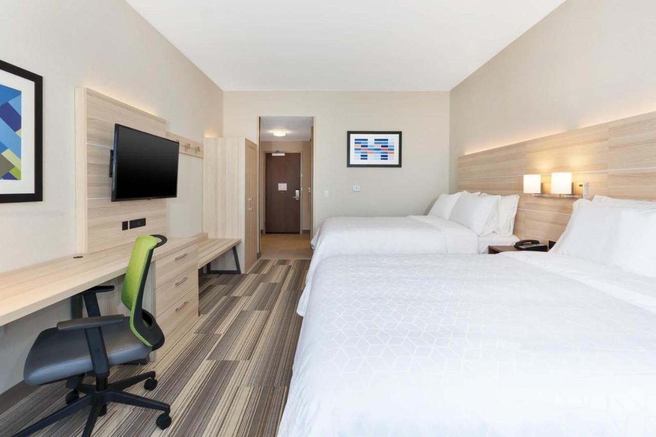 Queen Room with Two Queen Beds - Non-Smoking at Holiday Inn Express & Suites Grand Rapids Airport - South by IHG