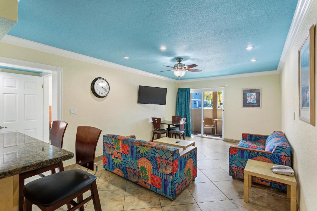 Deluxe One Bedroom Suite: 1 Queen Bed and 2 Sleeper Sofas at Bay Palms Waterfront Resort - Hotel and Marina