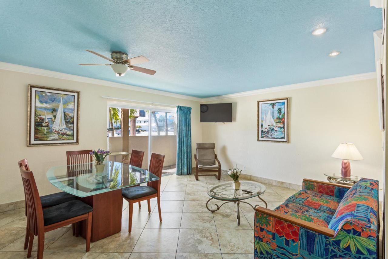 Deluxe One Bedroom Suite: 2 Queen Beds and 1 Sleeper Sofa at Bay Palms Waterfront Resort - Hotel and Marina