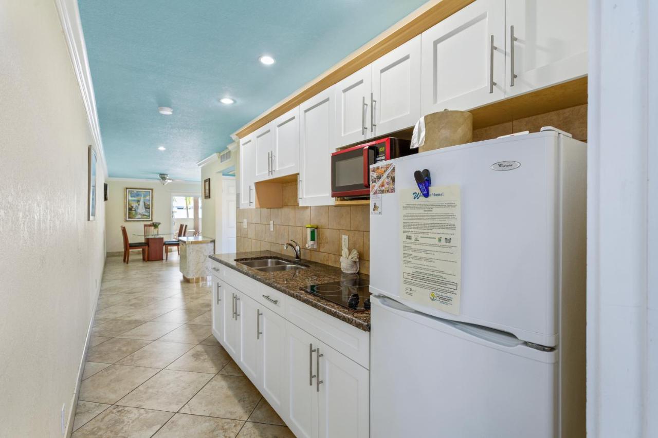 Deluxe One Bedroom Suite: 2 Queen Beds and 1 Sleeper Sofa at Bay Palms Waterfront Resort - Hotel and Marina