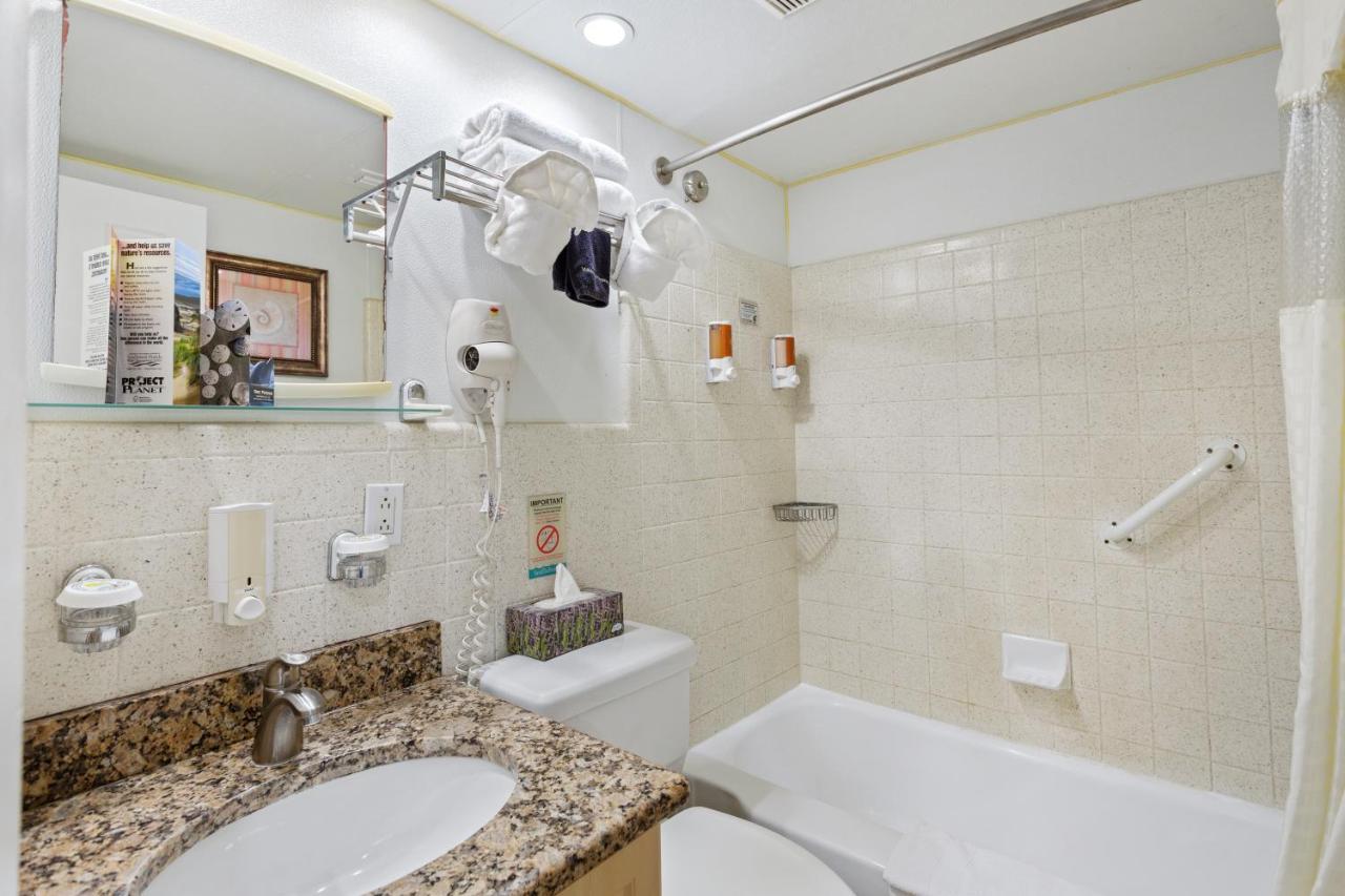 Deluxe One Bedroom Suite: 2 Queen Beds and 1 Sleeper Sofa at Bay Palms Waterfront Resort - Hotel and Marina