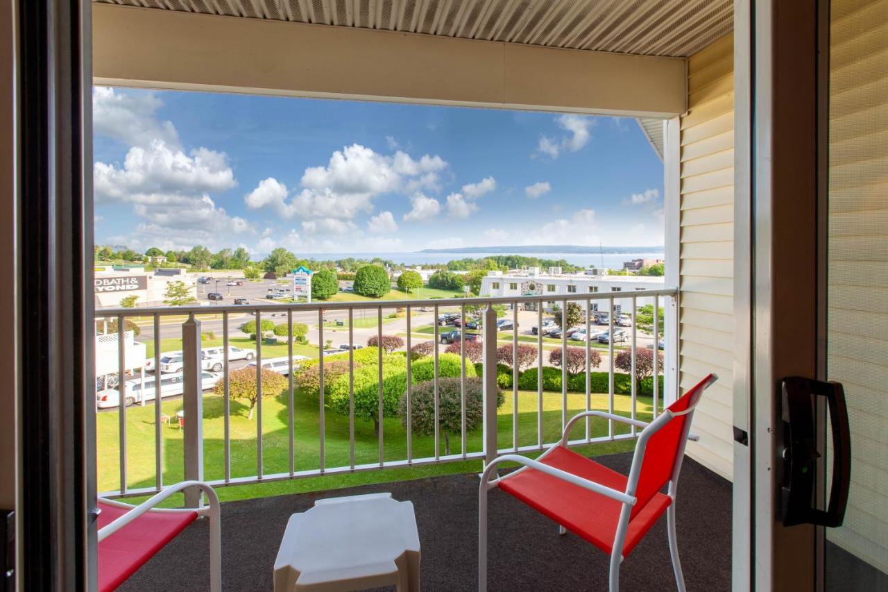 Queen Room with Two Queen Beds with Balcony at Apple Tree Inn, SureStay Collection by Best Western