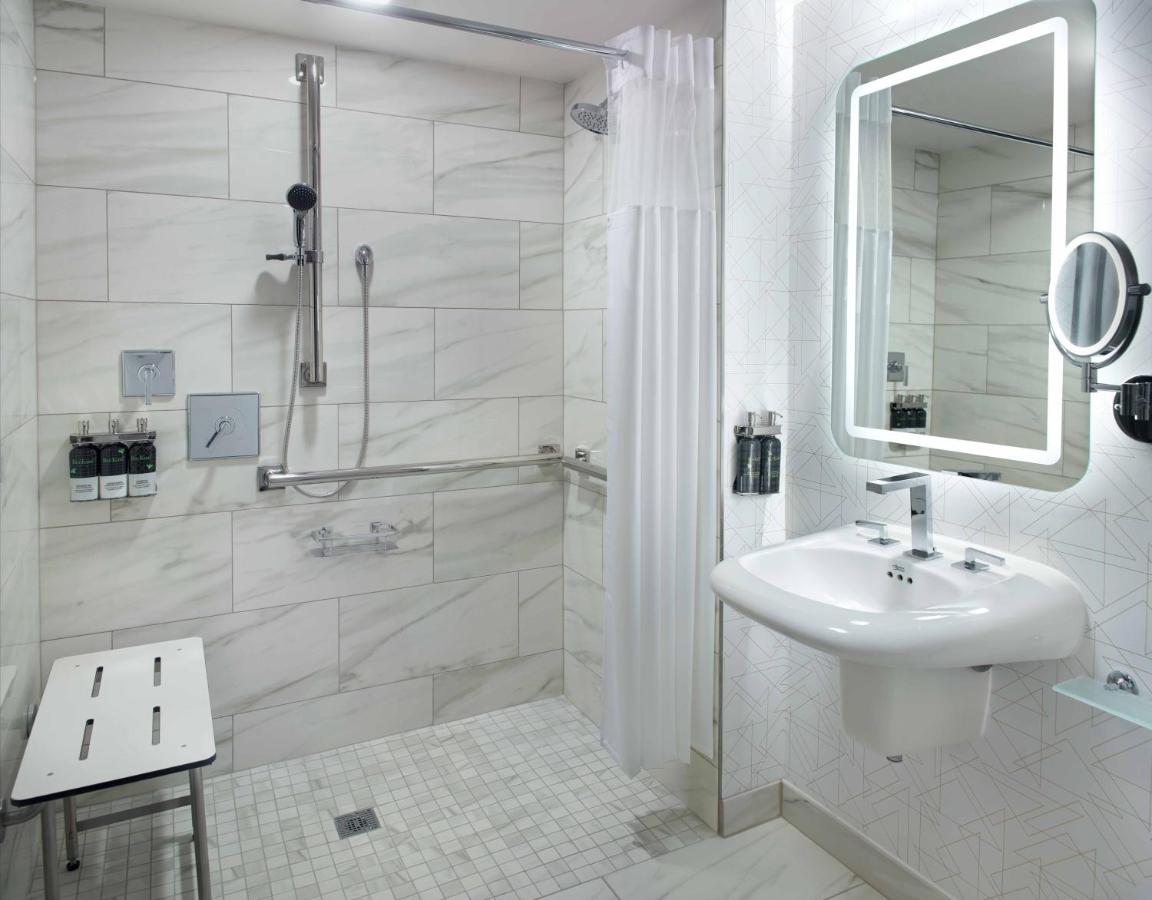 Deluxe 1 King Bed Mobility Accessible w/ Roll-In Shower at Georgia Tech Hotel and Conference Center