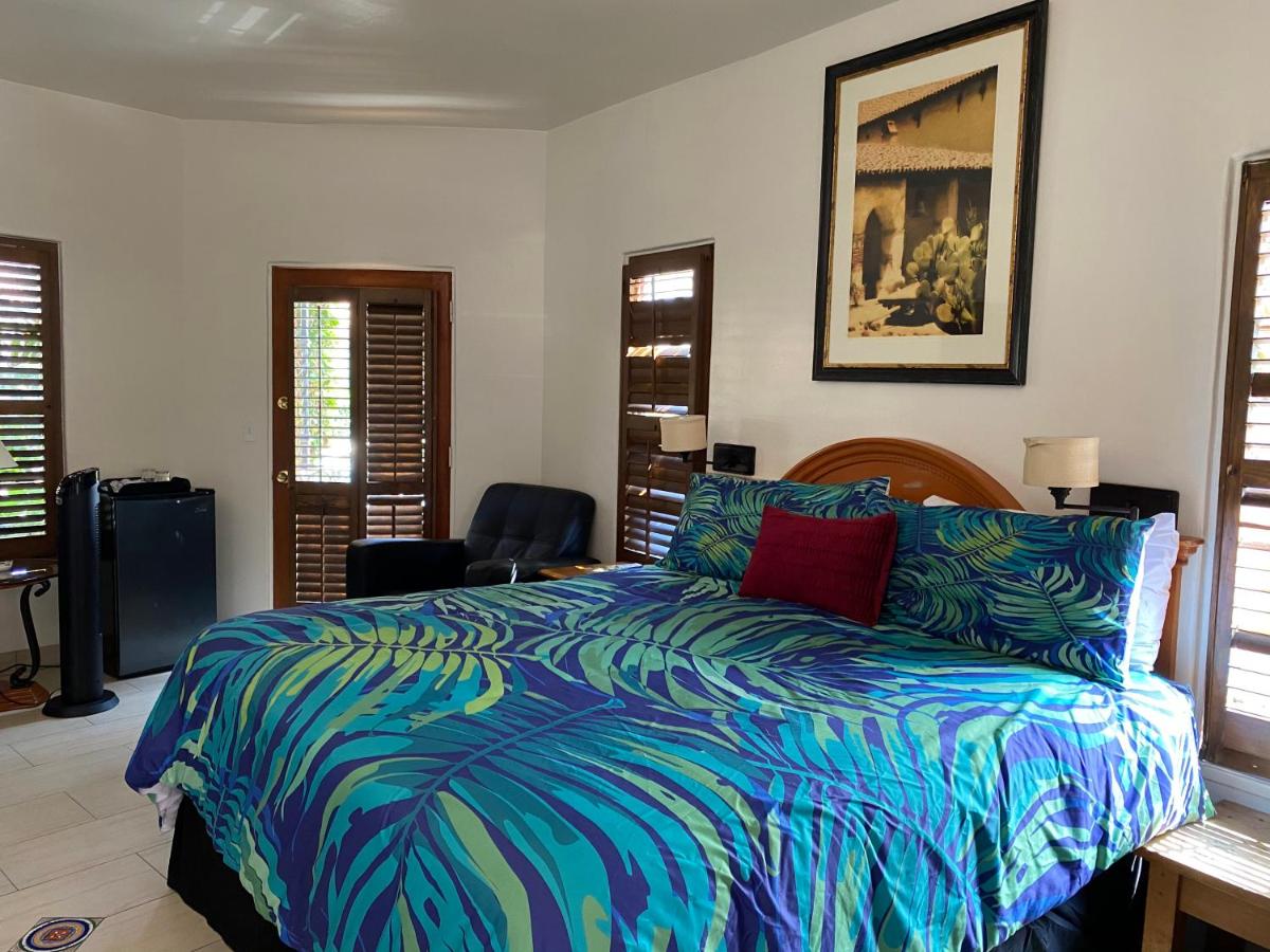 King Room with Balcony at Villa Rosa Inn