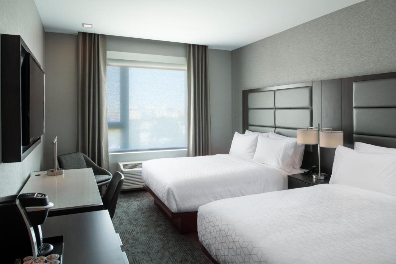 Queen Room with Two Queen Beds - Hearing Accessible - Non-Smoking at Holiday Inn Express Boston Logan Airport - Revere by IHG