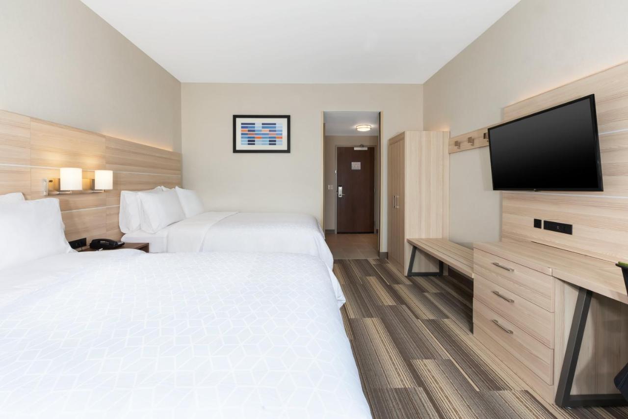 Queen Room with Two Queen Beds - Non-Smoking at Holiday Inn Express & Suites Grand Rapids Airport - South by IHG