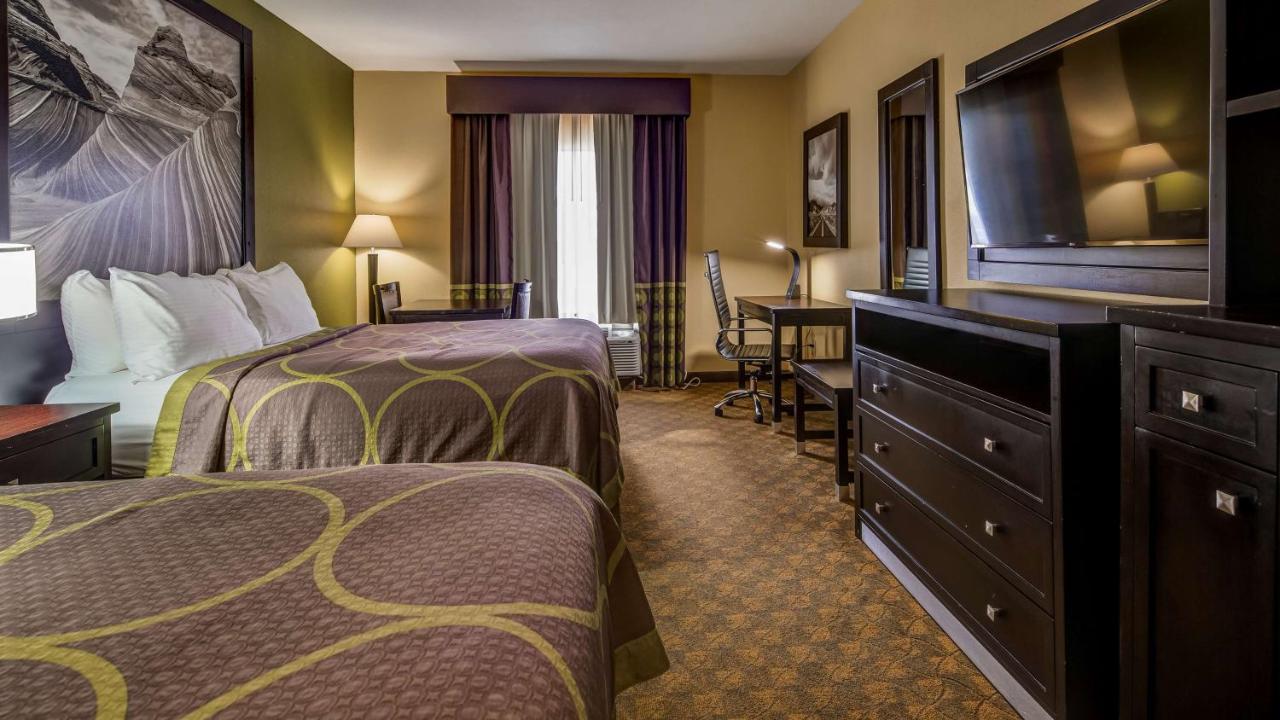 Queen Room with Two Queen Beds at SureStay Plus Hotel by Best Western Alvin