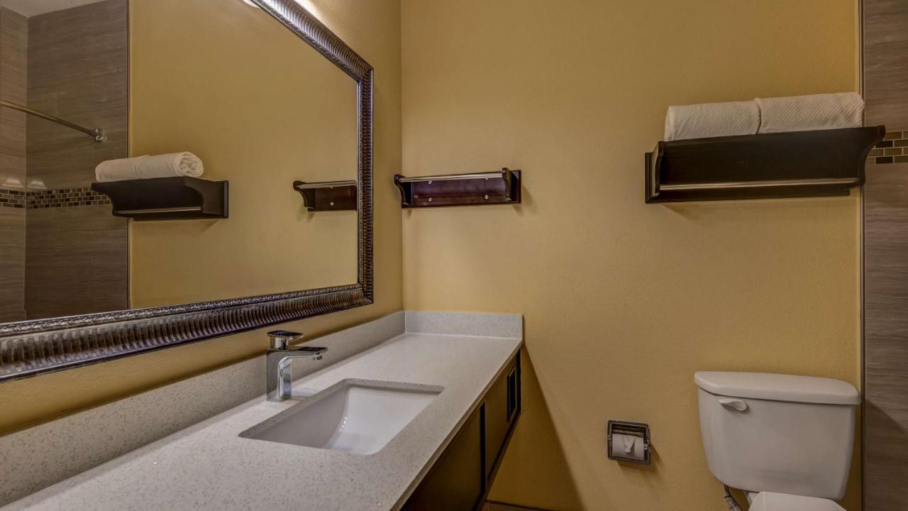 Queen Room with Two Queen Beds at SureStay Plus Hotel by Best Western Alvin