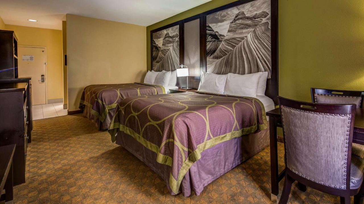 Queen Room with Two Queen Beds at SureStay Plus Hotel by Best Western Alvin
