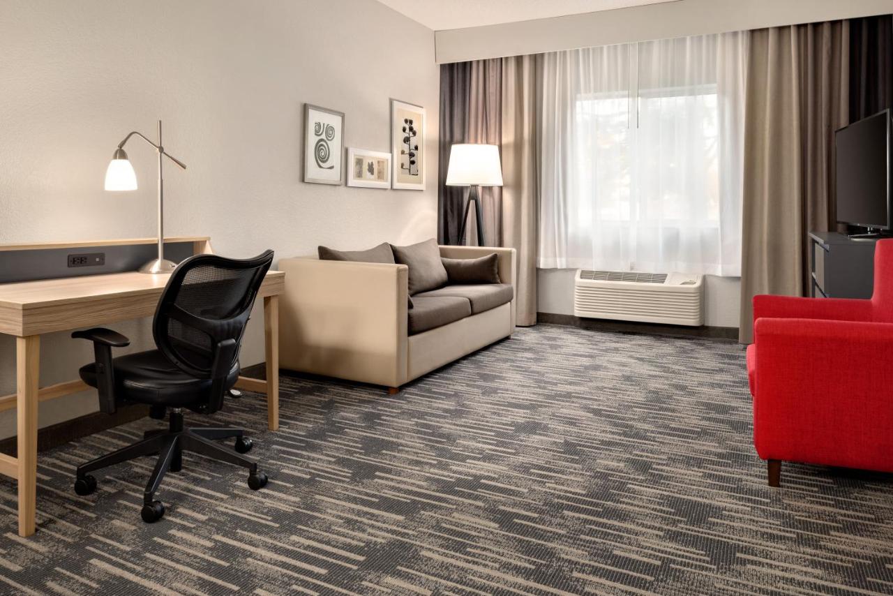 Extended Stay Two-Bedroom Suite with One King and Two Queen Beds - Kitchenette/Non-Smoking at Country Inn & Suites by Radisson, Brookings, SD